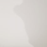 Woman models a strapless pink brocade A-line dress with a slit, turning to show the back before walking off screen.