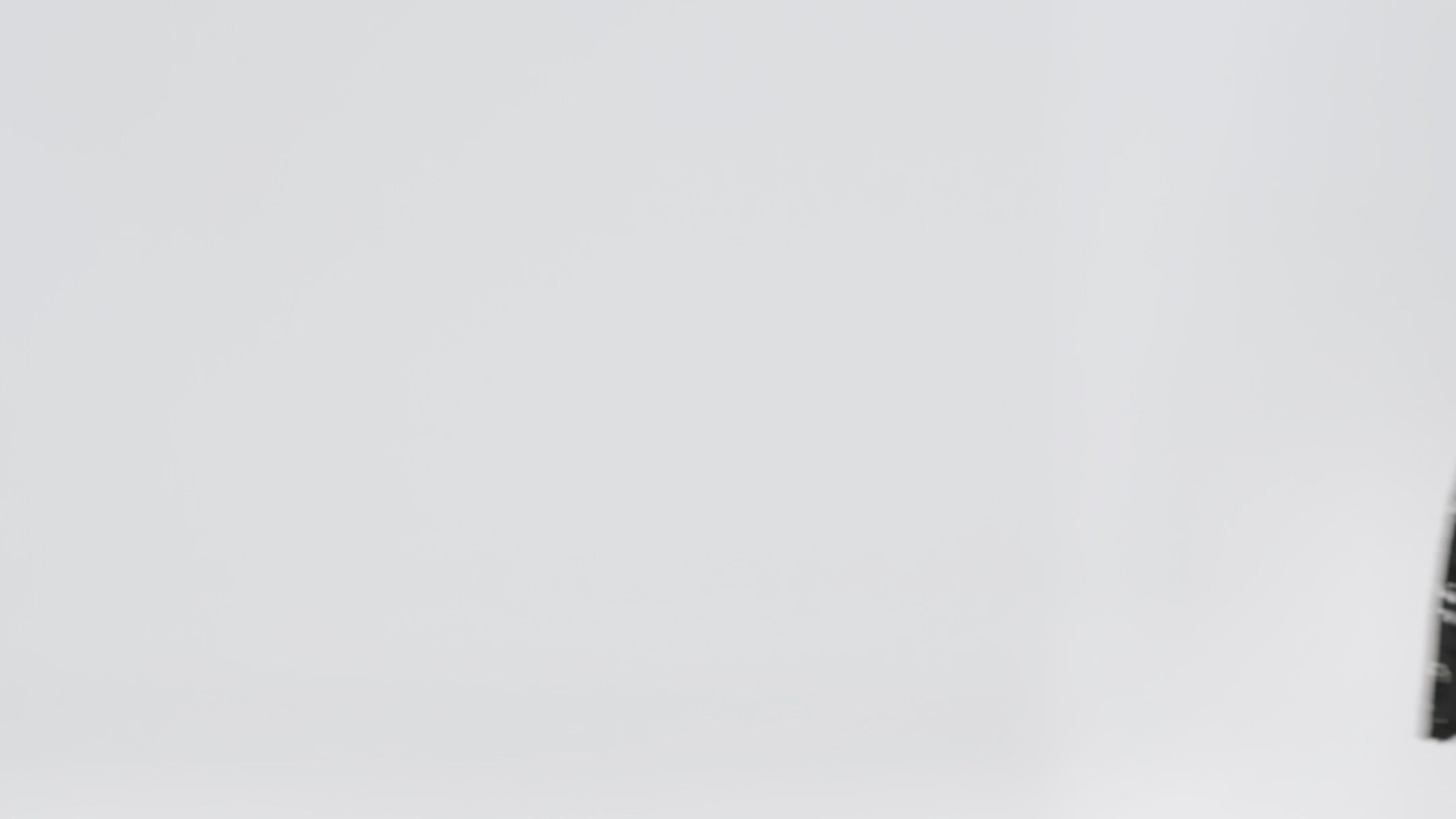 Plus size little black dress made of Guipure lace. Cap sleeves, scoop neckline and center back zipper. CE2601 available in sizes 14-24 in black. Celebrations by Sydney's Closet.