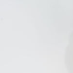 Woman models a black sequin A-line dress with a V-neckline and flowing cape sleeves, turning to show the back before walking off screen.