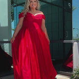 Long formal satin ballgown style SC7400 by Sydney's Closet. Available in sizes 14-32 in colors cobalt blue, onyx black and ruby red.  Pleated bodice with exposed boning, detachable pleated drape sleeves, basque waist and pockets.  