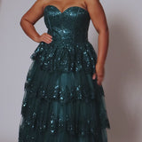 Strapless, sweetheart plus size gala formal ballgown. Exposed corset boning on bodice covered in lace applqiues. Tiered A-line skirt with matching lace applique hem. Style SC7398 is available in forest green, navy blue or burgundy red by Sydney's Closet. 
