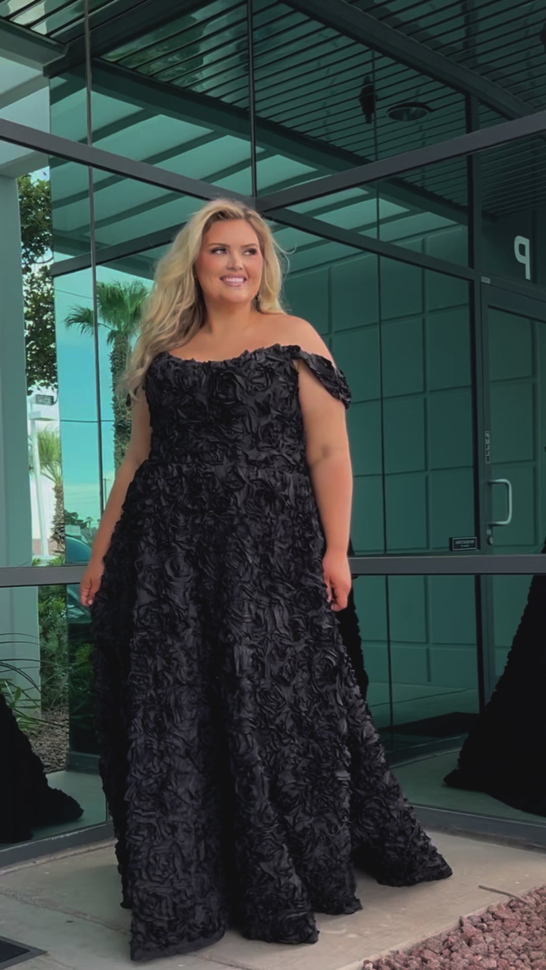 Plus size formal event dress. 3D floral fabric. Scoop neckline with cat-eye detail, detachable drape sleeves, A-line skirt with pockets and train.  Sydney's Closet style SC7397 available in black or ivory. 
