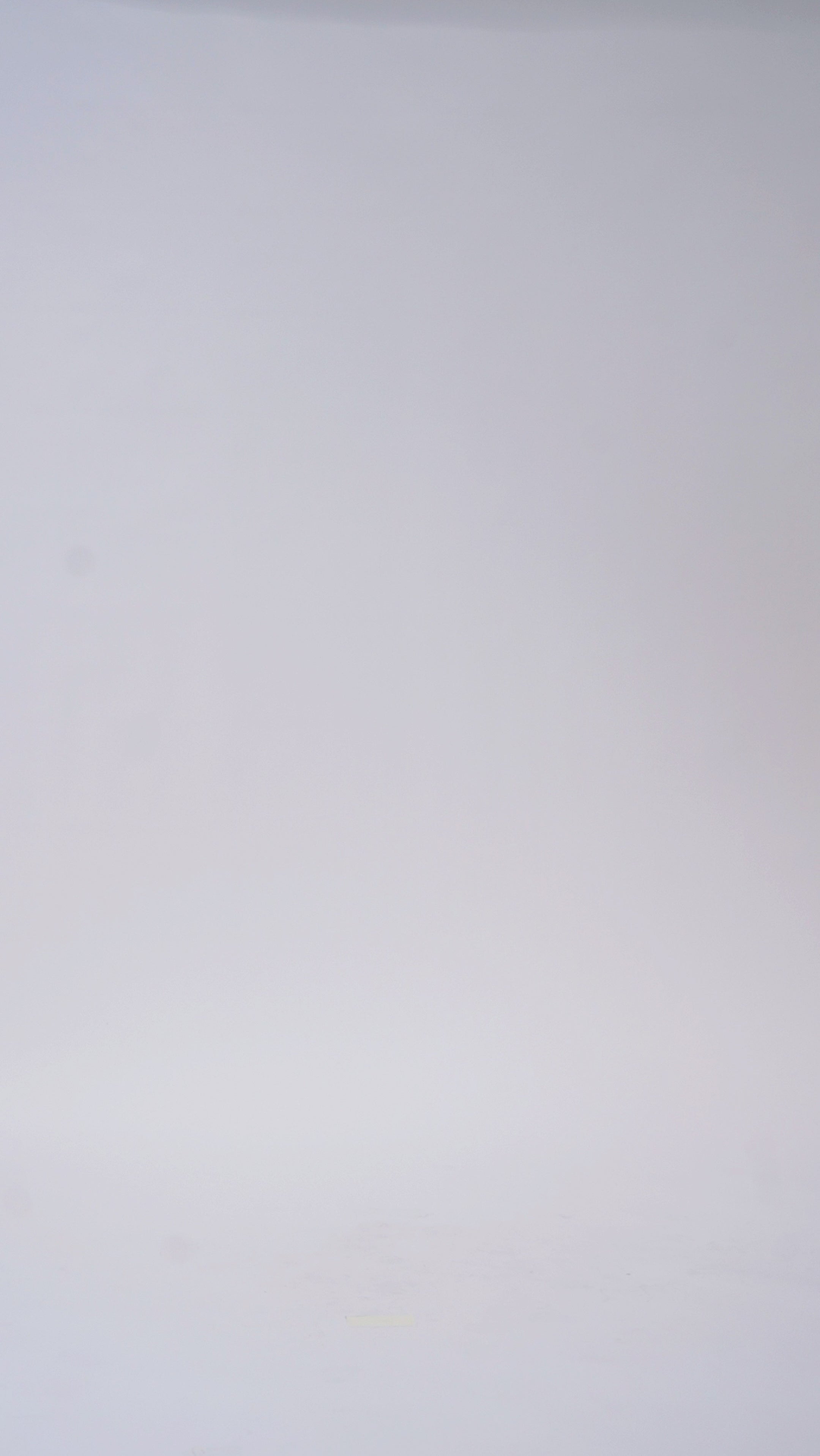 Woman models a white strapless lace mini dress with a sweetheart neckline and corset bodice, turning to show the back before walking off screen.