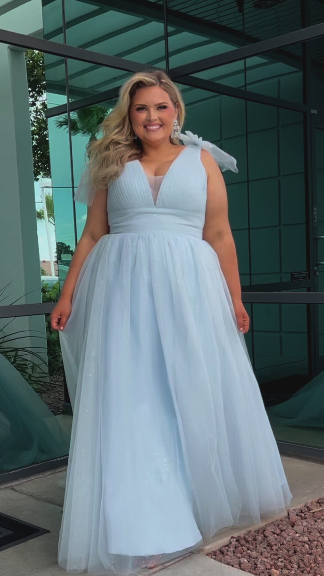 Plus Size princess A-line prom dress with bra-friendly straps, pleated bodice, pleated waistband and full A-line skirt with train. Detachable bows on shoulder. SC7417 in ice blue, mauve or sage green from Sydney's Closet.