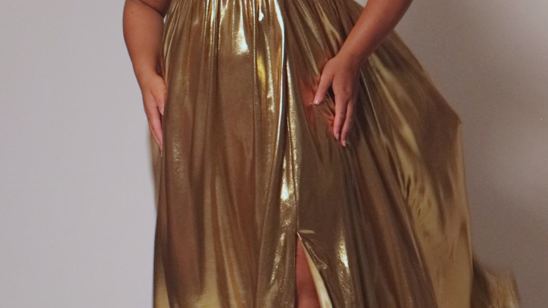 Empire plus size formal dress with spaghetti straps, pleated bodice with knot detail, pockets and slit. Available in gold, onyx black and ruby red. SC7414 by Sydney's Closet