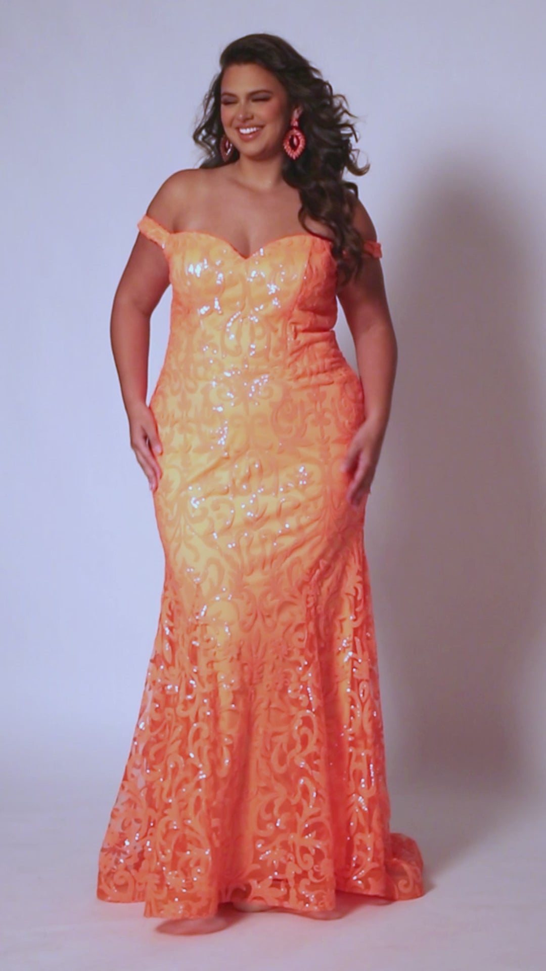 Sydney's Closet SC7372 Blue and orange. Mermaid Silhouette, Floor length, Sequin Net, V-neckline, Fitted Bodice, Off-the-Shoulder, Center-back Zipper, Natural Waistline, Mermaid Skirt with Train, Stretch Knit Lining.