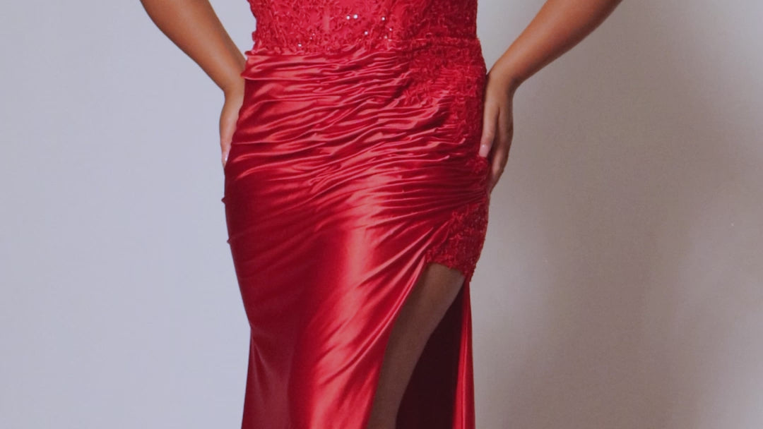 Tease Prom TE2413 Ruched skirt into high slit with lace insert at top of slit, lace covered bodice with removable lining, double spaghetti straps.