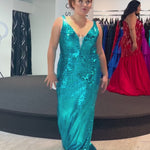 Johnathan Kayne for Sydney's Closet JK2405 Turquoise, Unicorn, Magenta. Fitted silhouette, Piano key sequin on net, Deep V-neckline, Tone-on-tone mesh insert, Straps = 1 inch, V-cut out on side under arm, Upside down teardrop keyhole cutout, Center back zipper, Fitted skirt.