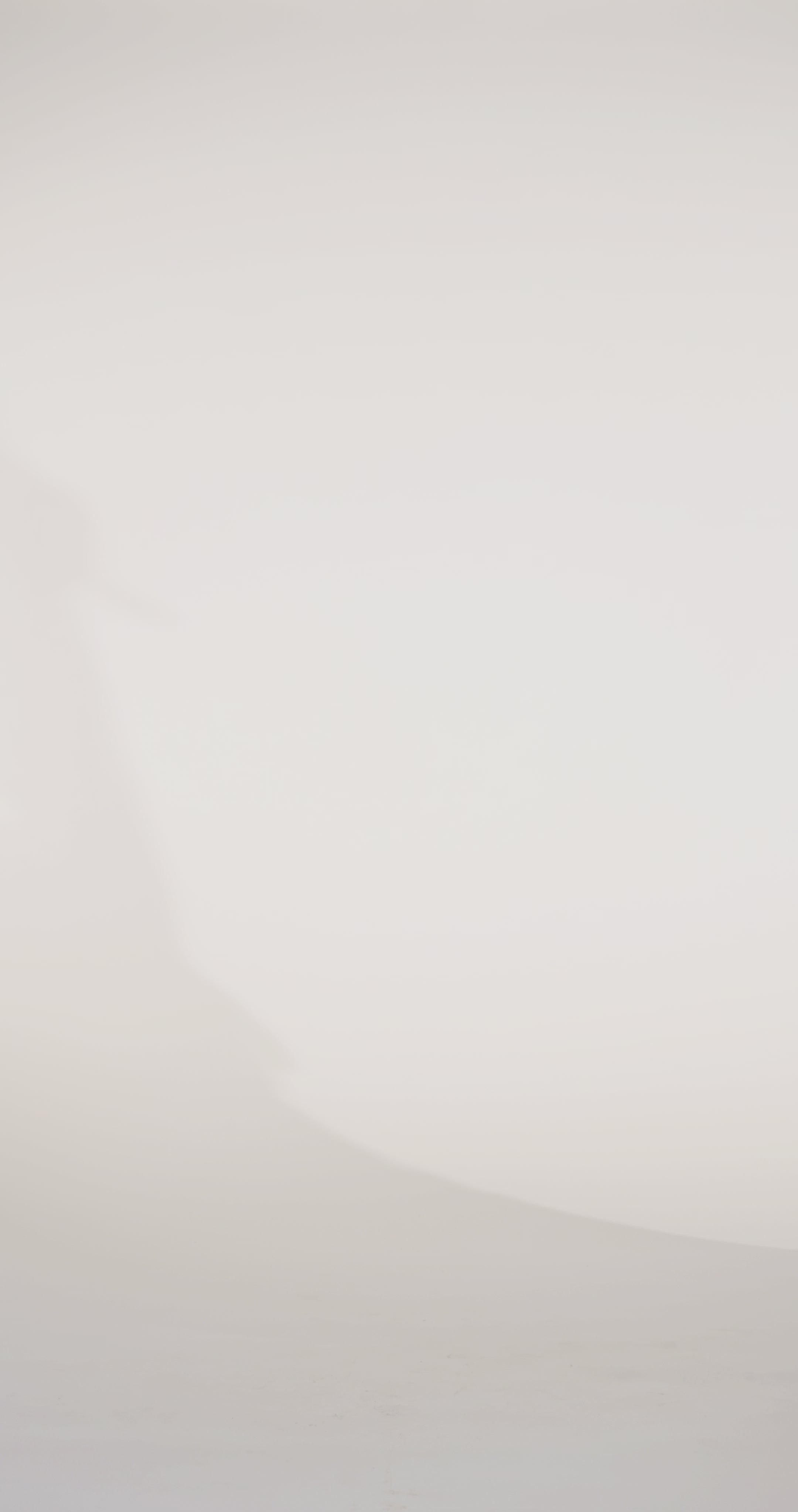 Woman models a black satin slim dress with a slit, off-the-shoulder sleeves, a sheer bodice with sequin appliqués and beading, and a lace-up back, showing the front and back before walking off screen.