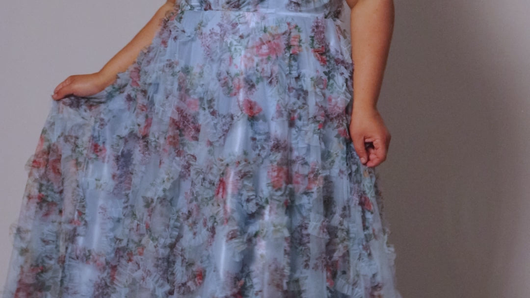 Plus size 3D floral print A-line prom dress.  V-neckline with spaghetti straps, mesh insert and pleated bodice. A-line skirt with pockets. Availablit in light blue, hot pink, royal blue and lilac in sizes 14-32. Style TE2508 from Tease Prom.