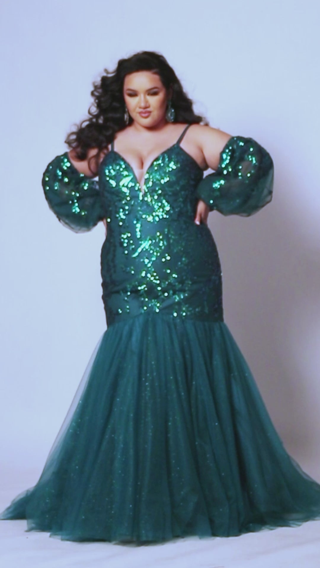 Tease Prom TE2439 Emerald. Mermaid silhouette, Iridescent leaf sequins with sparkle tulle, Deep V-neckline, Nude mesh insert, Spaghetti straps covered in sparkle tulle, Detachable puff sleeves covered in sequin, snaps on and off, Long invisible center back zipper, Mermaid skirt, Sweep train.