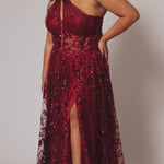 Plus size prom ball gown with glitter lace and tulle. Style TE2529 by Tease Prom is avialable in burgundy red, forest green or onyx black in sizes 14-32.  One shoulder with illusion cut out on sweetheart bodice with exposerd corset boning. 