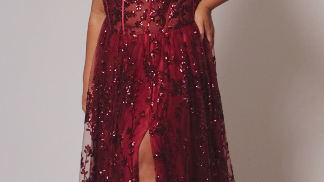 Plus size prom ball gown with glitter lace and tulle. Style TE2529 by Tease Prom is avialable in burgundy red, forest green or onyx black in sizes 14-32.  One shoulder with illusion cut out on sweetheart bodice with exposerd corset boning. 