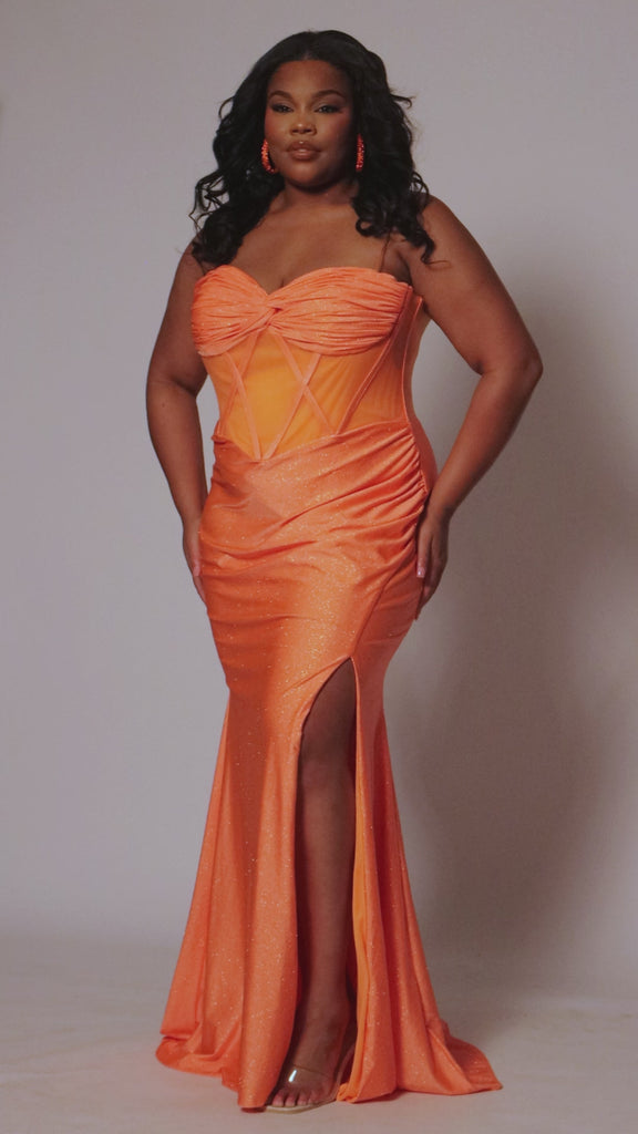 Tease Prom style TE2506 plus size fitted mermaid dress. Spaghetti straps on sweetheart pelated bodice with criss-cross boning and basque waistline. Slim fitted skirt with ruching and high slit. Available in fuchsia pink or tangerine orange.