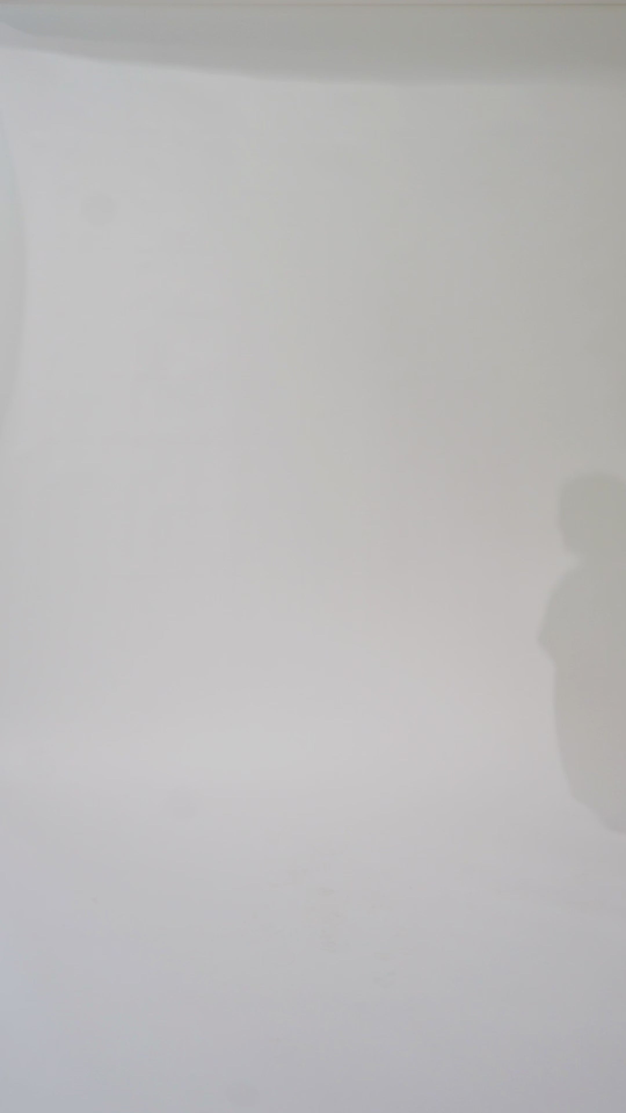 Woman models a blue off-the-shoulder A-line dress with a floral pattern, turning to show the back before walking off screen.