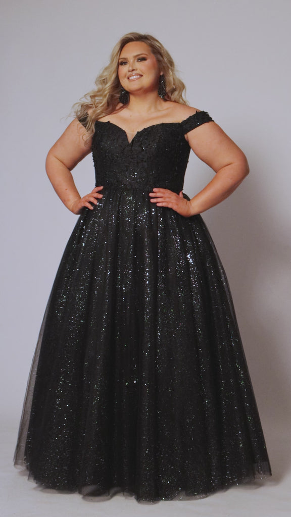 Plus size elegeant off-the-shoulder ball gown with 3D floral lace and sparkle tulle. Full A-line skirt and center back zipper. Availablie in burgundy red, onyx black and plum purple in plus sizes 14-40. Style SC7428 from Sydney's Closet.