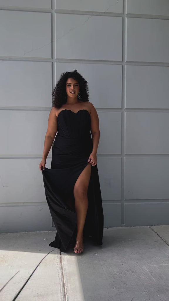 Sparkle stretch lycra plus size formal dress.  Strapless sweetheart neckline, basque waistline, exposed corset boning on bodice, ruchsed fitted skirt with high slit and zipper back. Available in sapphire blue, emerald green and onyx black. SC7412 by Sydney's Closet