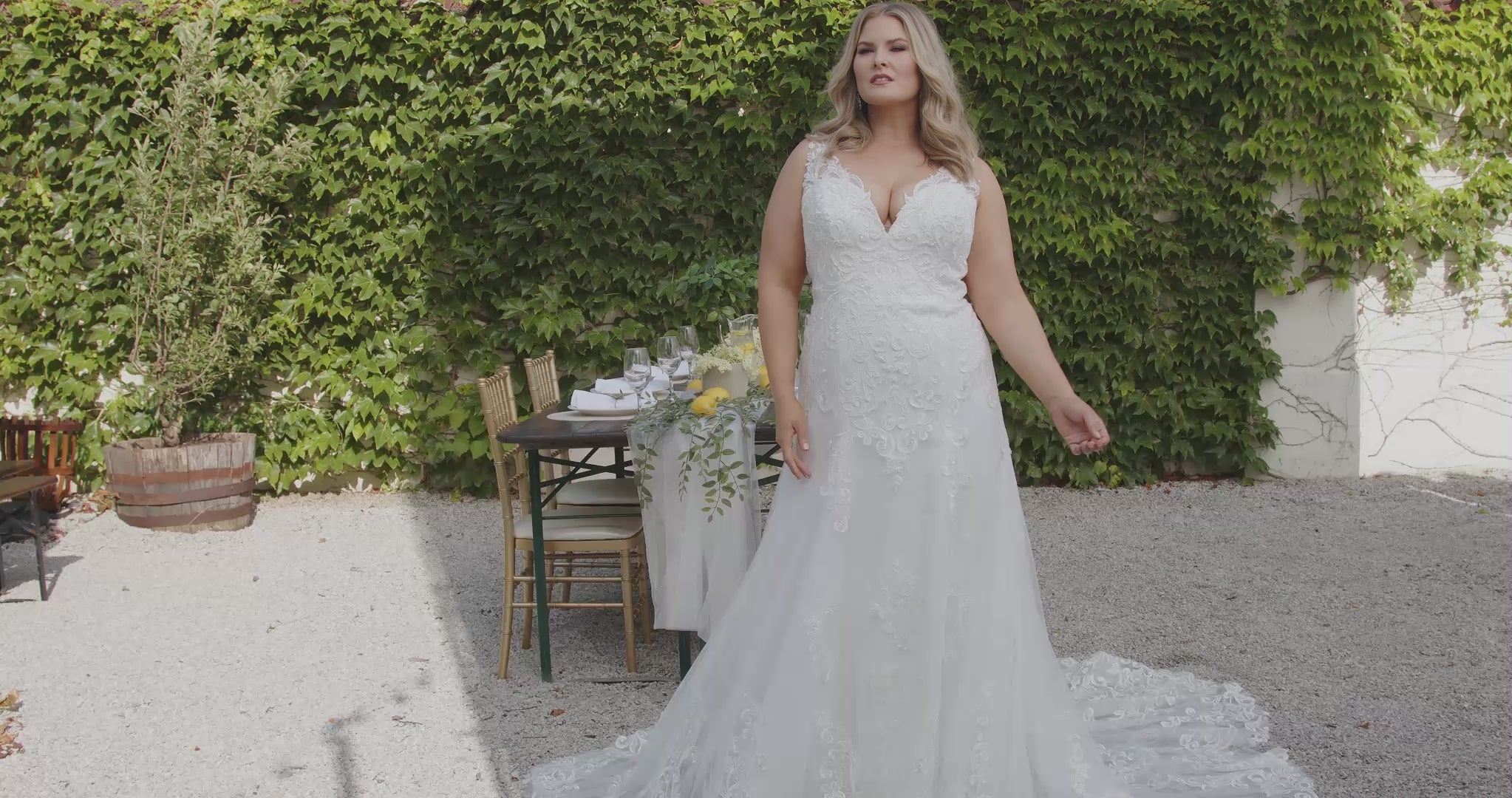 Michelle Bridal MB2410 Ivory. Mesh embroidered floral lace appliques, Chantilly lace, soft bridal tulle, Embellished with pearls, clear sequins, bugle beads, cut glass. Fitted silhouette, V-neckline, Two-inch lace straps, unlined Scoop back with optional back lining included, Natural waistline, Center back zipper.