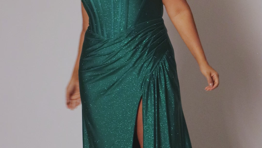 Sparkle stretch lycra plus size formal dress.  Strapless sweetheart neckline, basque waistline, exposed corset boning on bodice, ruchsed fitted skirt with high slit and zipper back. Available in sapphire blue, emerald green and onyx black. SC7412 by Sydney's Closet