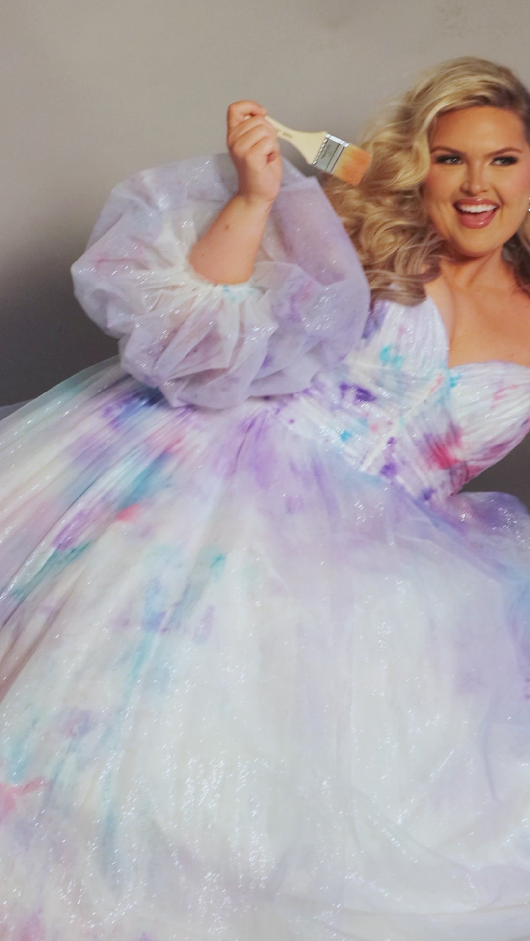 Michelle Bridal MB2324 Black. Ball Gown silhouette, Glitter tulle, Sweetheart neckline, Sleeveless, Strapless, Optional pouf sleeves with elastic wrist, Long invisible center back zipper, Pleated sweetheart bodice, Natural waist, Full sequin tulle skirt, Chapel train, Detachable belt included, Optional straps included.