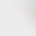 Woman models a floor length brown leopard print dress with a V-neckline and flutter sleeves, turning to show the back before walking off screen.