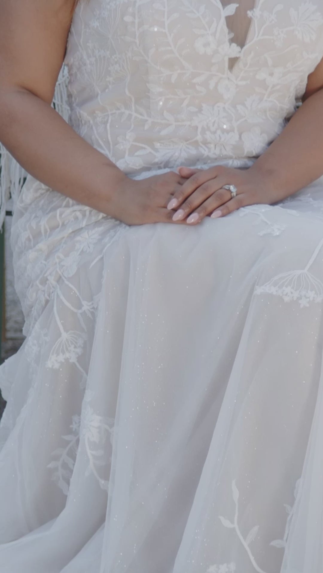 Michelle Bridal MB2402 Mocha. Soft bridal tulle, glitter tulle, Stretch knit jersey lining, Leaf appliques with clear sequins, V-neckline, Illusion Back, Center back zipper covered with 41 buttons fastened with loops