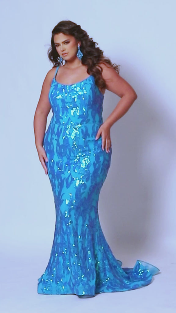 Tease Prom TE2307 product video. Slim A-line silhouette with a scoop neckline and ½ inch straps covered in lace. Scoop back and a center back zipper. Sequins over stretch knit 5 inch train 2 inch horsehair hem. 