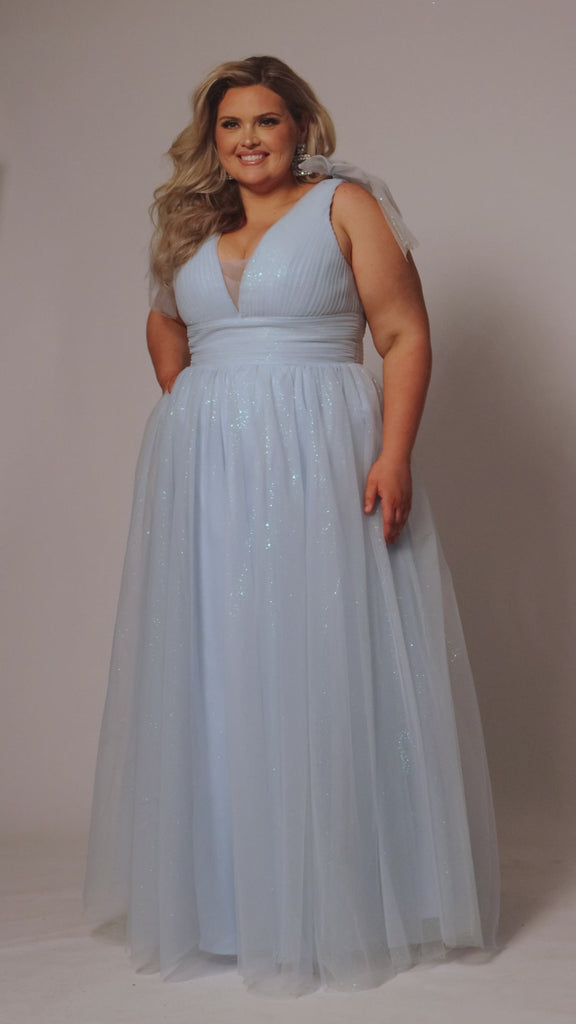 Plus Size princess A-line prom dress with bra-friendly straps, pleated bodice, pleated waistband and full A-line skirt with train. Detachable bows on shoulder. SC7417 in ice blue, mauve or sage green from Sydney's Closet.