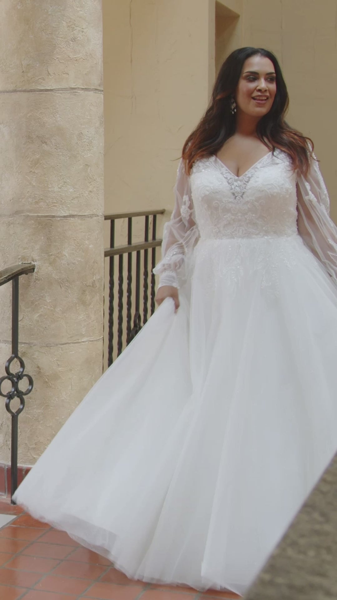 Michelle Bridal MB2415 Ivory. Soft bridal tulle over sparkle tulle over soft bridal tulle over tulle, A-line, V-neckline, Bodice is illusion mesh covered in appliques, long sleeve covered with appliques, Natural waistline, Long invisible center back zipper.