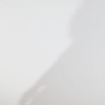 Woman models a black strapless satin gown with a draped neckline and thigh-high slit, turning to show the back before walking off screen.