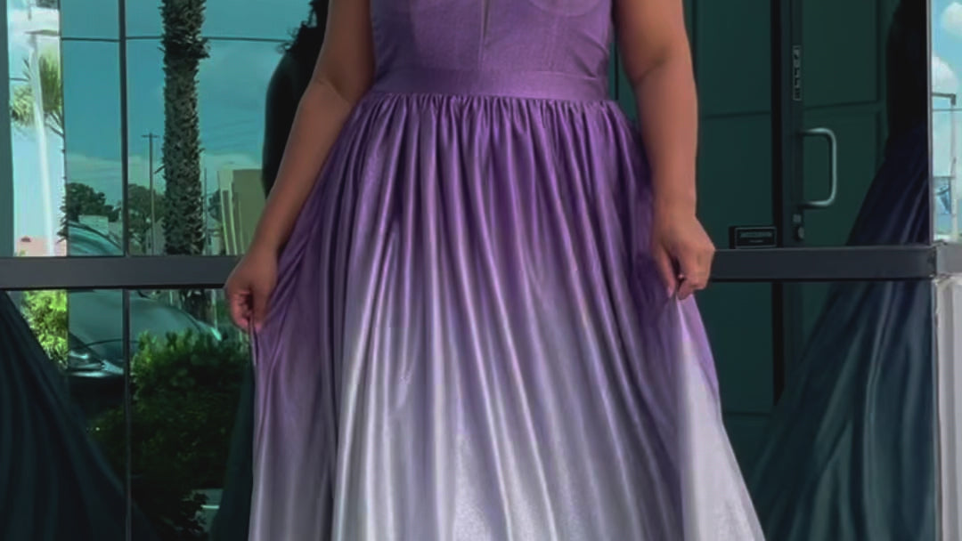 Plus size ombre prom ballgown. Halter neckline with nude mesh insert, waistband, gathered A-line skirt with pockets and horsehair hem.  Lace-up back with modesty panel. Available in purple or green by Sydney's Closet.
