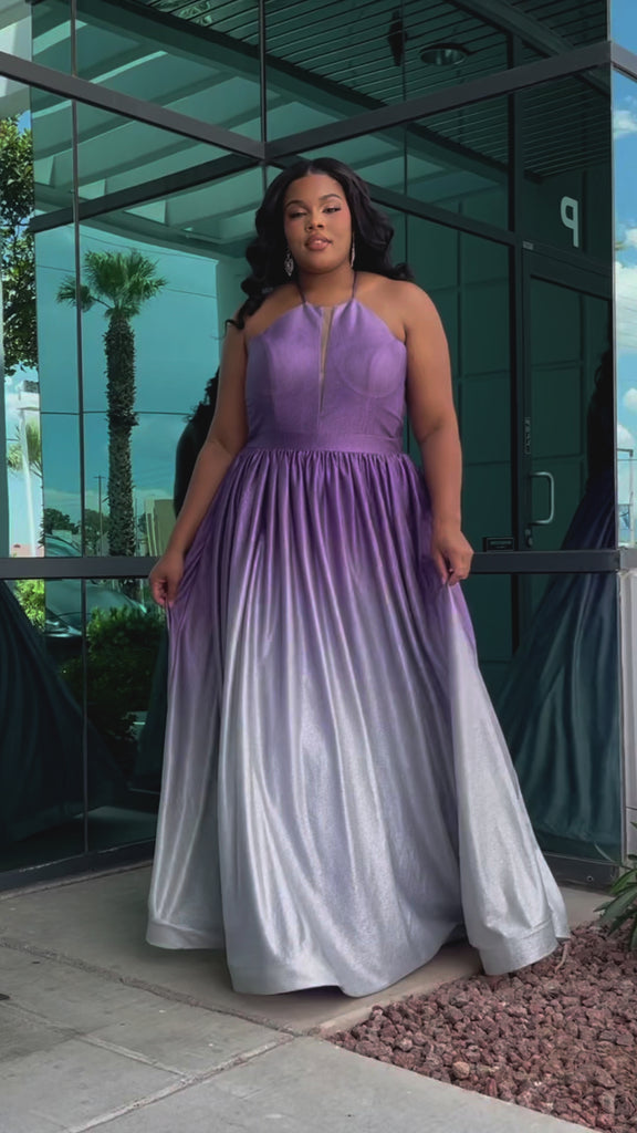 Plus size ombre prom ballgown. Halter neckline with nude mesh insert, waistband, gathered A-line skirt with pockets and horsehair hem.  Lace-up back with modesty panel. Available in purple or green by Sydney's Closet.