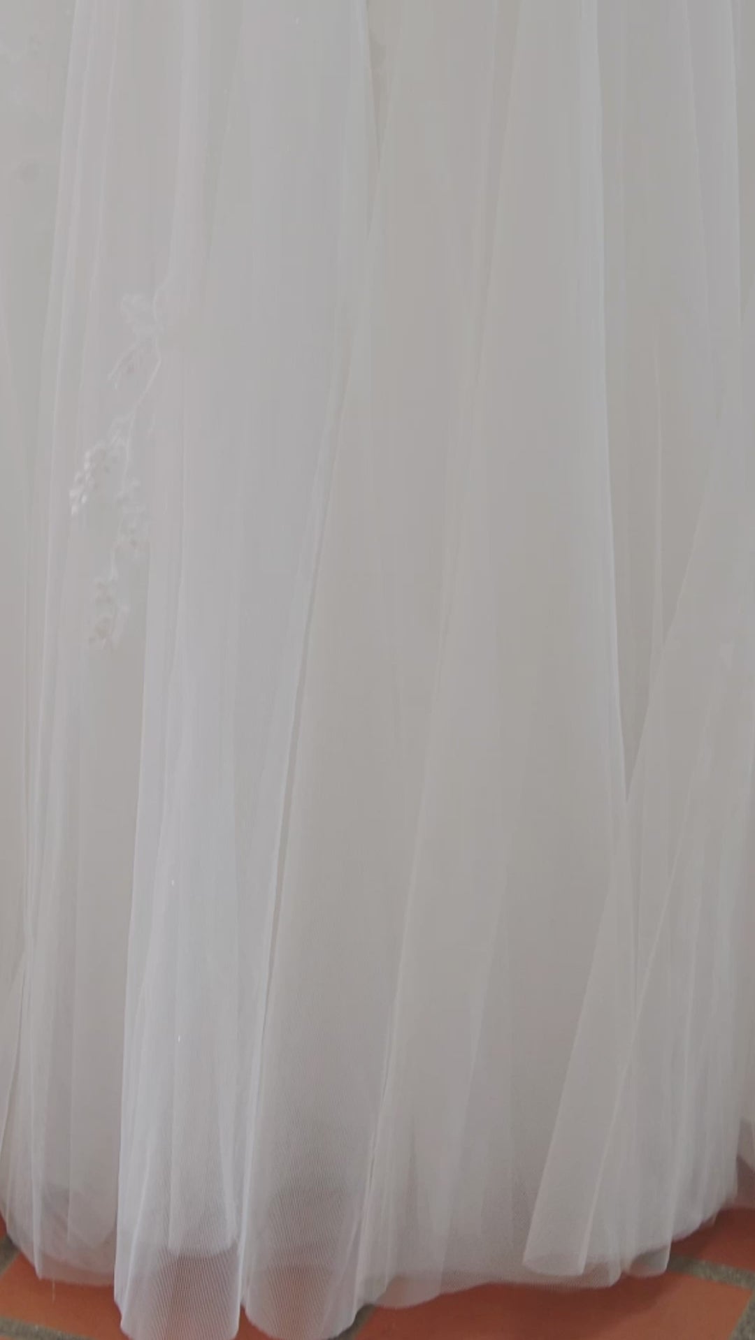 Michelle Bridal MB2425 Ivory. Modern leaf appliques Soft bridal tulle, sparkle tulle, soft tulle, light satin Crinoline = 2 layers, Satin layer, Clear & opaque sequins, pearls, bugle beads, cut glass, Strapless bodice, Optional 1 inch straps covered in lace appliques, Sweetheart neckline, Modified Basque waist.