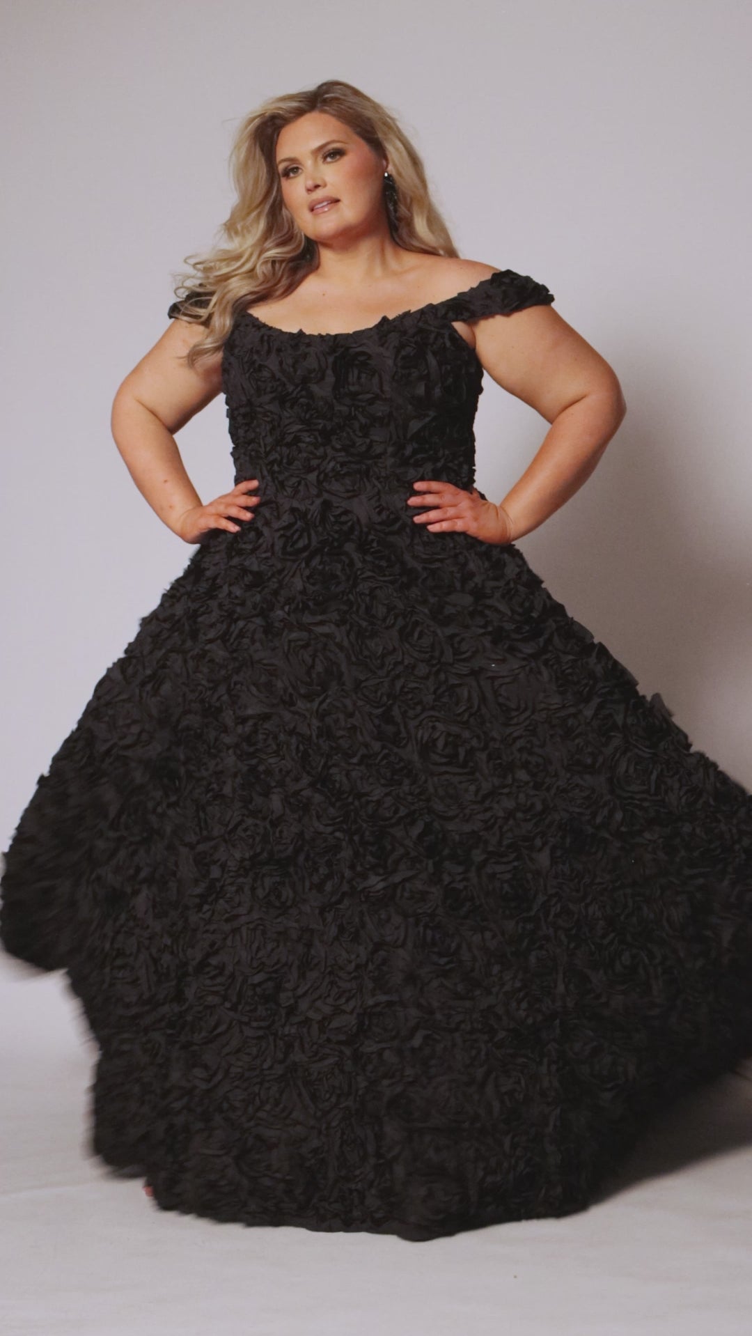 Plus size formal event dress. 3D floral fabric. Scoop neckline with cat-eye detail, detachable drape sleeves, A-line skirt with pockets and train.  Sydney's Closet style SC7397 available in black or ivory. 