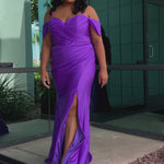 Sydney's Closet SC7402 sexy fitted prom dress in sparkle lycra .  Exposed boning on corset, drape sleeves with adjsutable spaghetti straps, high slit and ruchsed skirt. Available in violet purple, magenta pink, or turq blue and green. 