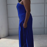 Sparkle stretch lycra plus size formal dress.  Strapless sweetheart neckline, basque waistline, exposed corset boning on bodice, ruchsed fitted skirt with high slit and zipper back. Available in sapphire blue, emerald green and onyx black. SC7412 by Sydney's Closet
