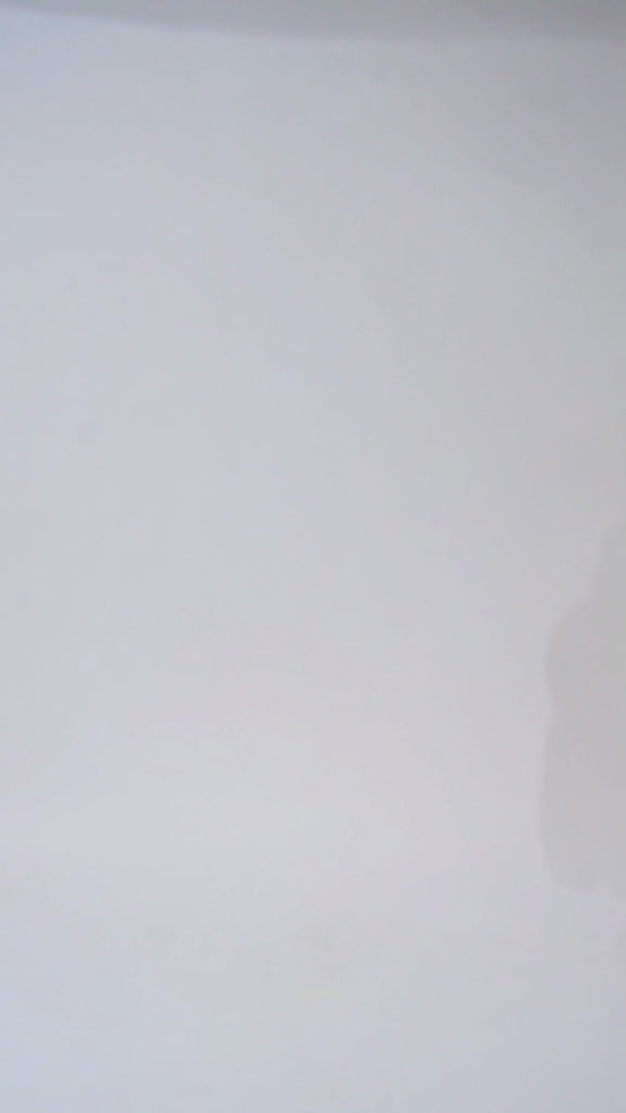 Woman models a pink off-the-shoulder A-line dress with a floral pattern, walking in to show the front before walking off screen.