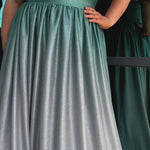 Plus size ombre prom ballgown. Halter neckline with nude mesh insert, waistband, gathered A-line skirt with pockets and horsehair hem.  Lace-up back with modesty panel. Available in purple or green by Sydney's Closet.