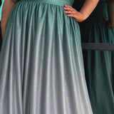 Plus size ombre prom ballgown. Halter neckline with nude mesh insert, waistband, gathered A-line skirt with pockets and horsehair hem.  Lace-up back with modesty panel. Available in purple or green by Sydney's Closet.