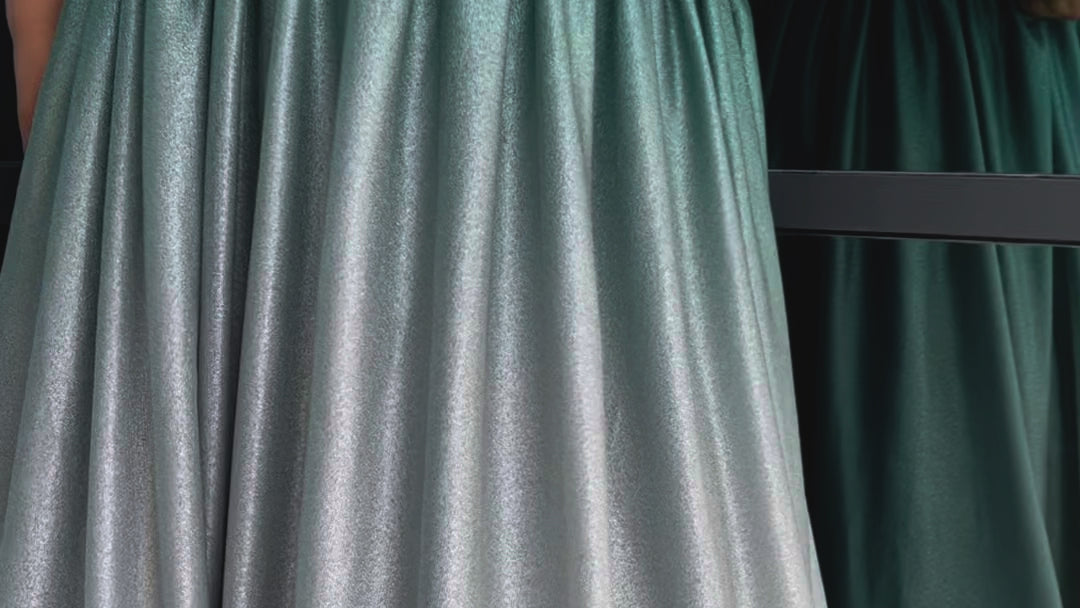 Plus size ombre prom ballgown. Halter neckline with nude mesh insert, waistband, gathered A-line skirt with pockets and horsehair hem.  Lace-up back with modesty panel. Available in purple or green by Sydney's Closet.