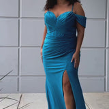 Sydney's Closet SC7402 sexy fitted prom dress in sparkle lycra .  Exposed boning on corset, drape sleeves with adjsutable spaghetti straps, high slit and ruchsed skirt. Available in violet purple, magenta pink, or turq blue and green. 