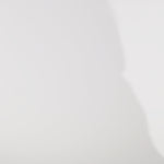 Woman models a slim red dress with a slit, exposed corset boning, a pleated band over the bust, and rhinestones along the neckline, showing the front and back before walking off screen.