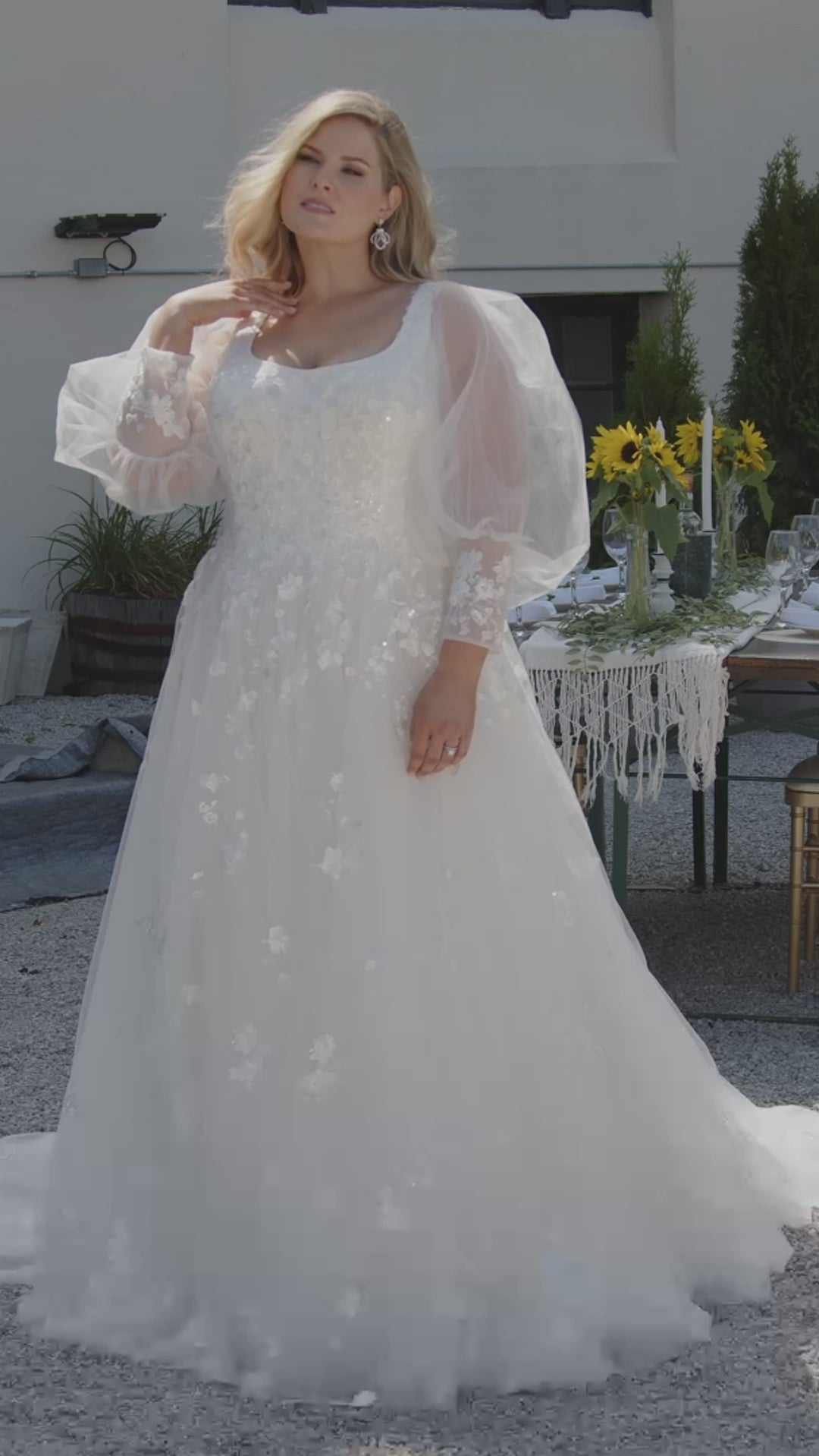 Michelle Bridal MB2308 Ivory. Soft bridal tulle, 3D floral lace appliques, A-line silhouette, Scoop neckline, Detachable pouf sleeve with lace and zipper on cuff included, Scoop back, Long invisible center back zipper, Full A-line skirt with 3D lace appliques on front and back.