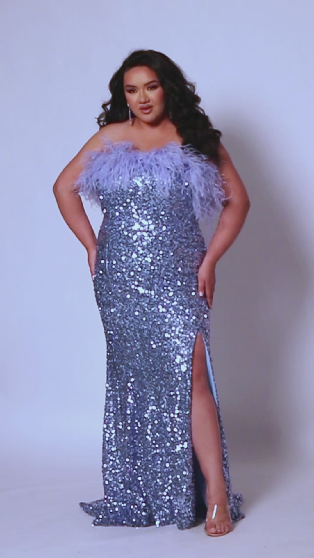 Tease Prom TE2418 Blue. Stretch sequin on net, Stretch knit lining, Straight neckline with ostrich feathers, Strapless, Natural waistline, Long invisible center back zipper, Slim skirt with a slit, Sweep train.