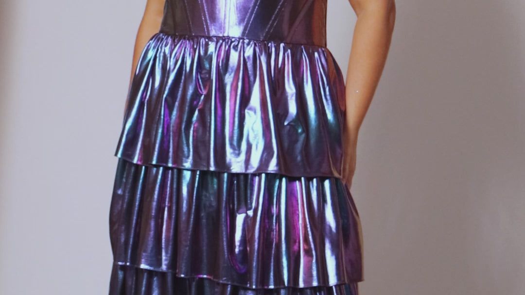 Tease Prom style TE2534 in peacock (blue/green) or prism (blue/purple). Halter plus size prom dress with ruched bodice and exposed corset boning.  Natural waistline and 5-tier A-line skirt with slit. 