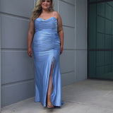 Slim fitted stretch satin plus size formal prom dress.  Pleated bodice, ruched skirt with gathered ties on slit, spaghetti straps and ruched back skirt with train.  Availablie in light blue, orange and lilac in sizes 14-24. Style SC7422 by Sydney's Closet. 