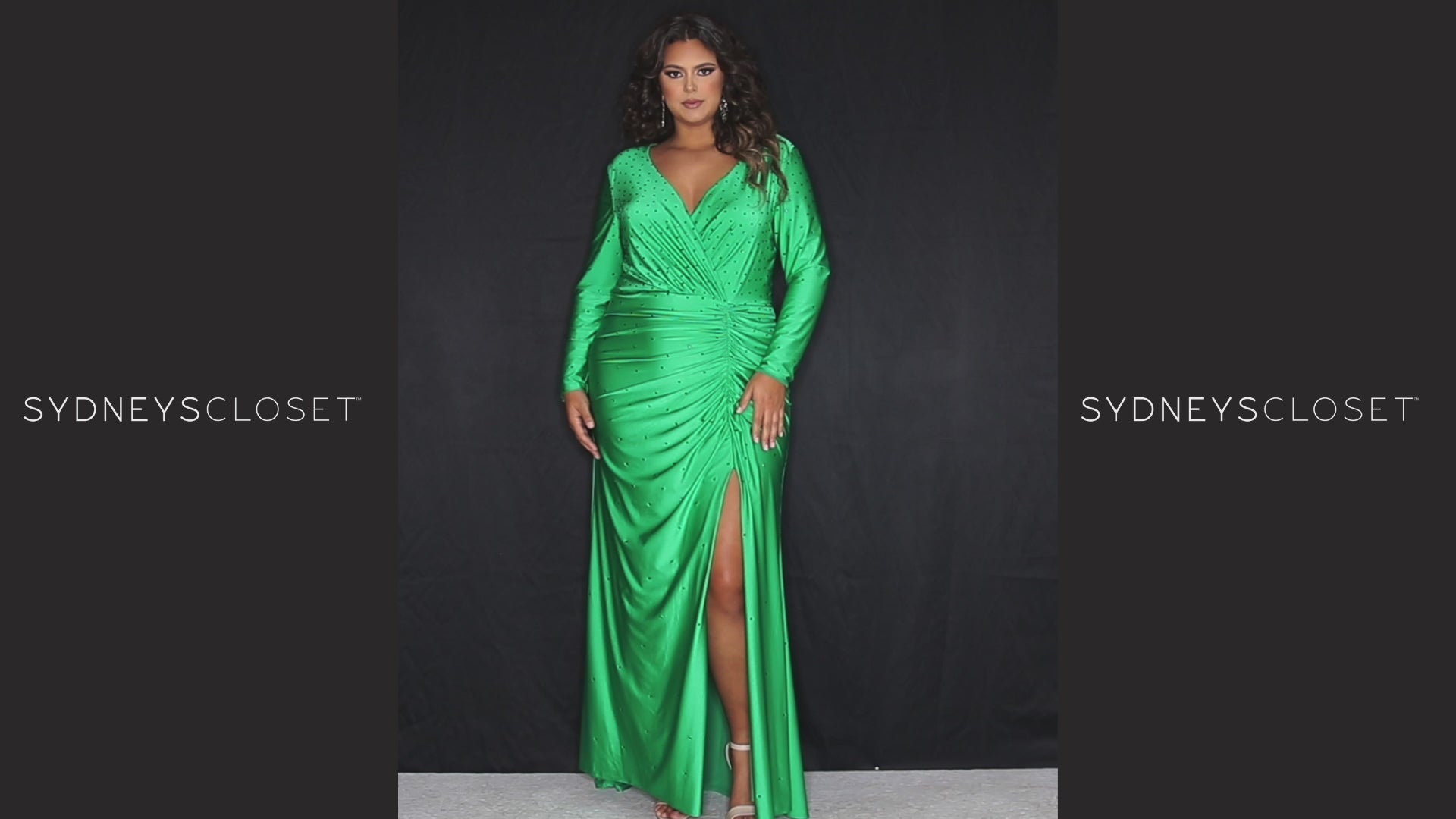 Sydney’s Closet SC7345  Stretch lycra with hot fix stones in bright blue, kelly green and hot pink. Fitted silhouette, full length sleeves and a deep V-neckline. Natural waist with ruching and left leg slit. A high back and sweep train. 