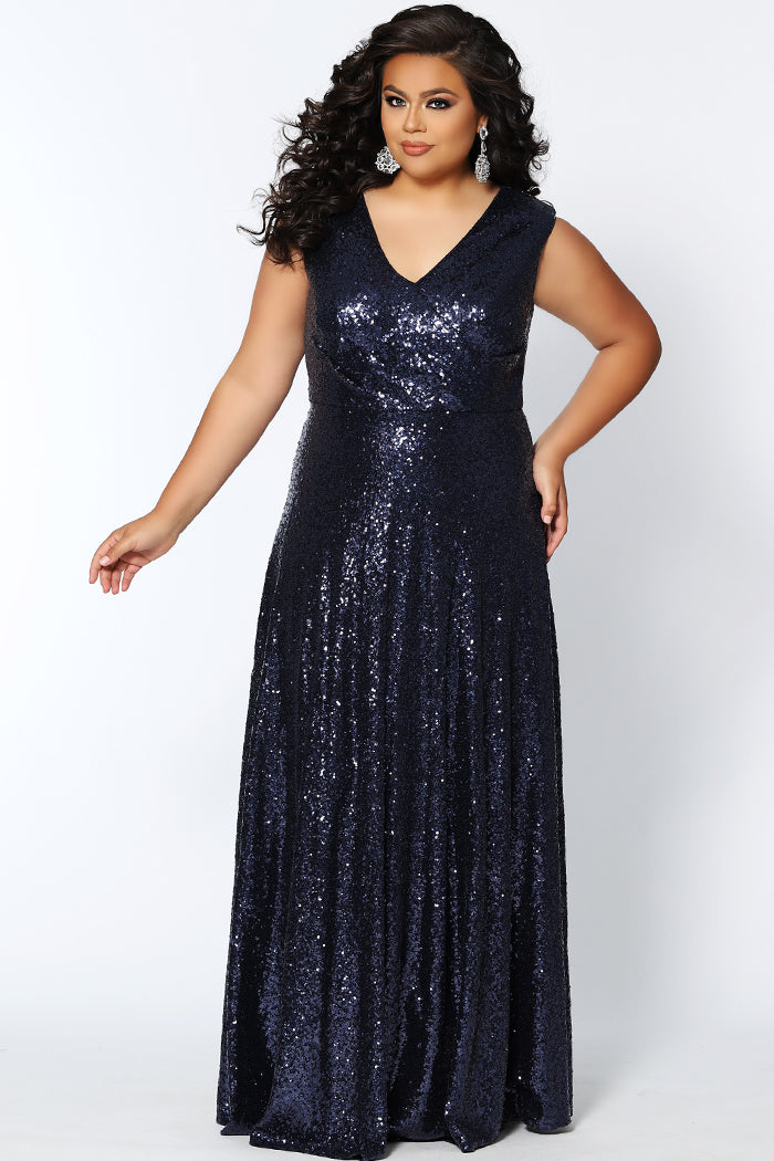CE1801 in navy, black or rose gold is a floor length sequin gown with bra-friendly straps and a V-neckline. Sydney's Closet plus size sequin dress