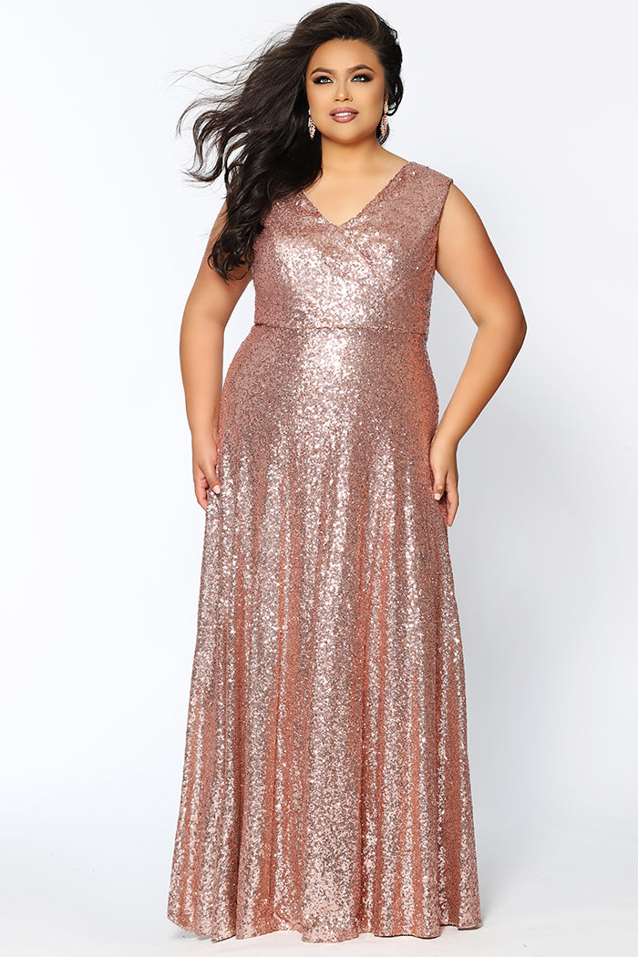 CE1801 in navy, black or rose gold is a floor length sequin gown with bra-friendly straps and a V-neckline. Sydney's Closet plus size sequin dress