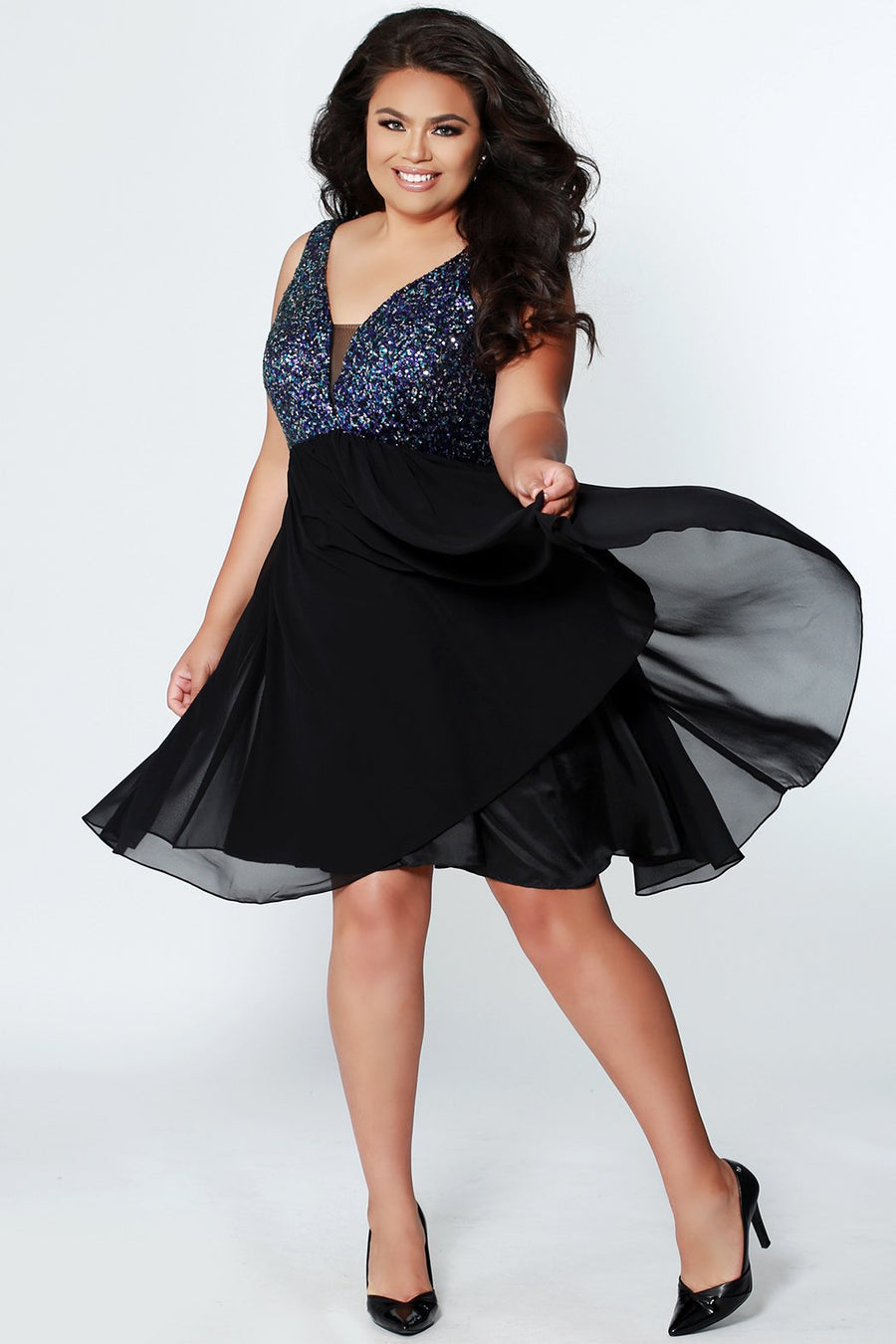 CE1820 has a V-neckline with illusion mesh net is heavily beaded and sequined on front and back. The dress is fully lined, with an A-line chiffon short skirt. It's sleeveless, with bra-friendly straps